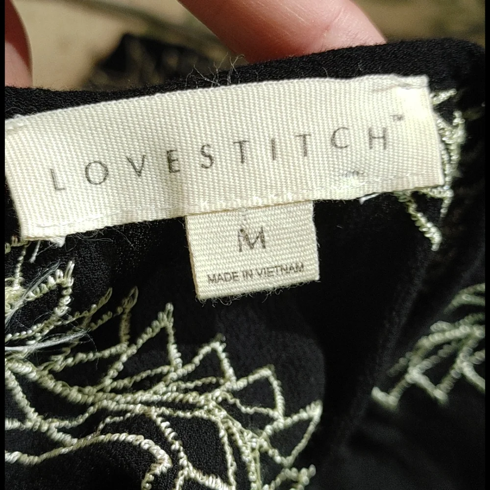 Lovestitch top- love tassels? I do